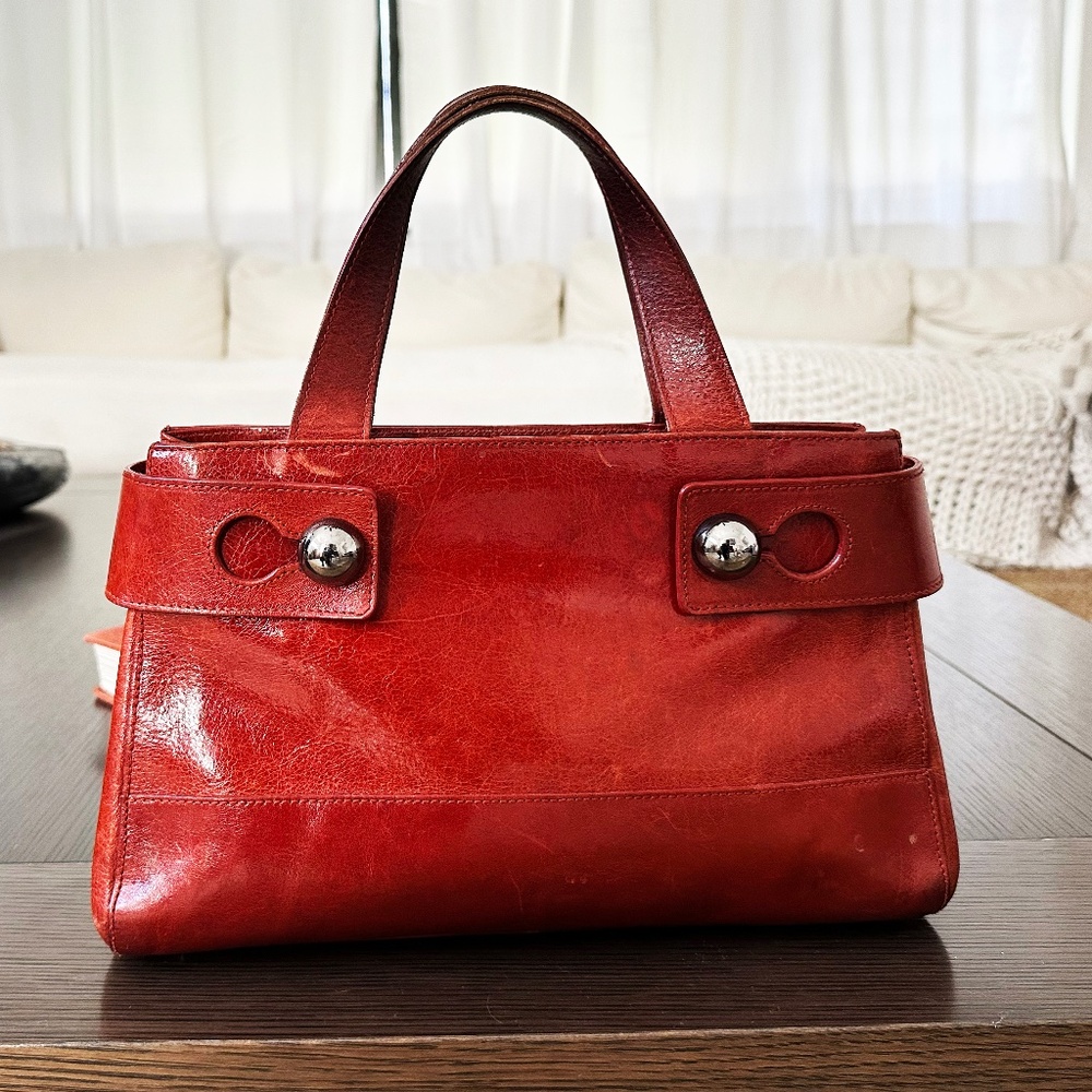 Authentic Furla handbag crafted in Italy from genuine leather.